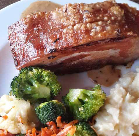 Pork belly with vegetables at African Swiss